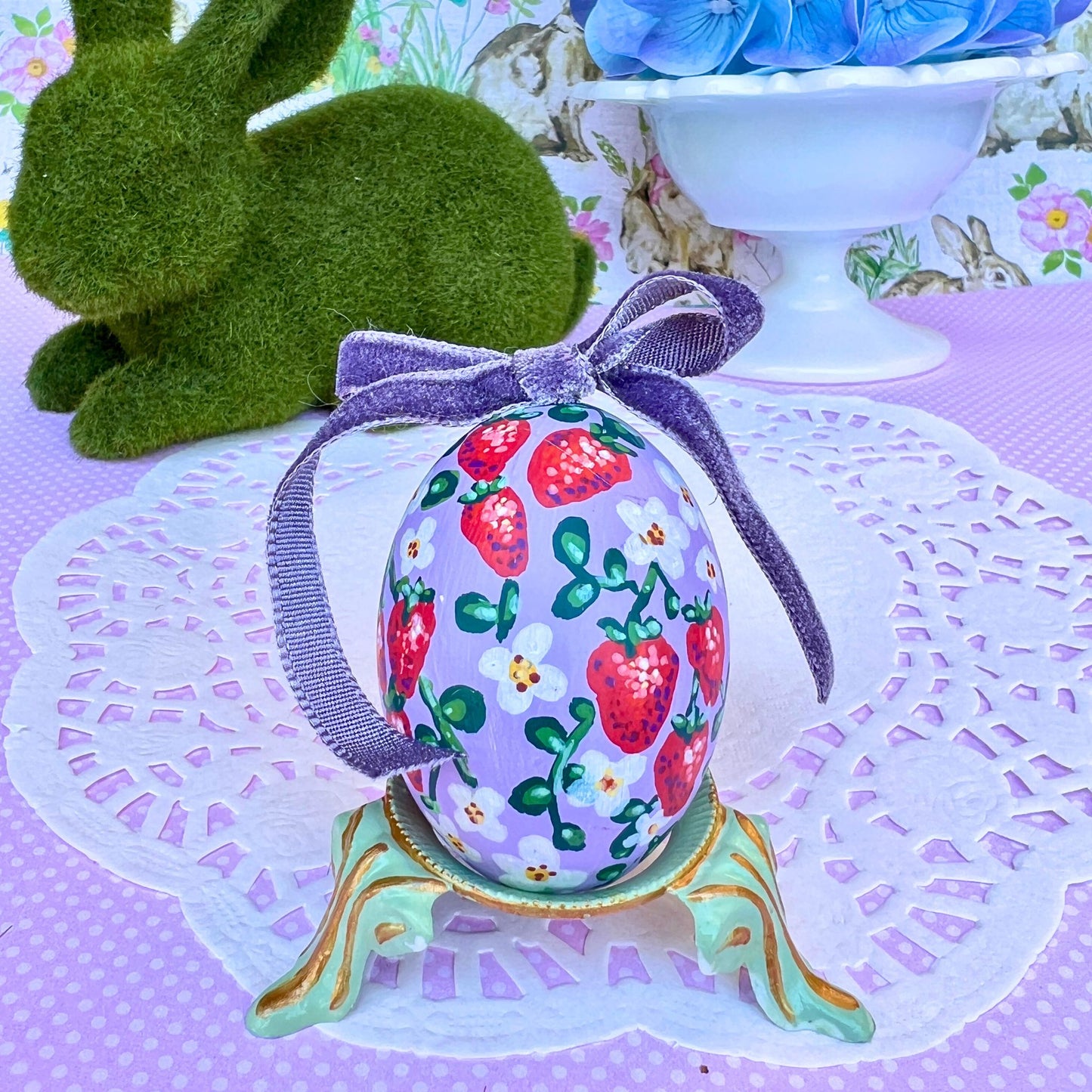 Small Hand Painted Egg Featuring Strawberries on a Lavender Background